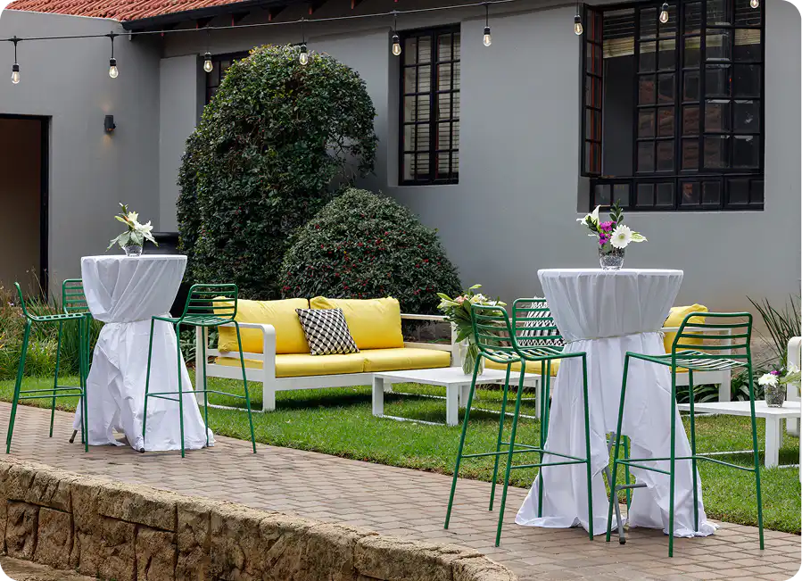 Outdoor courtyard event setup at Home Suite Hotels Rosebank