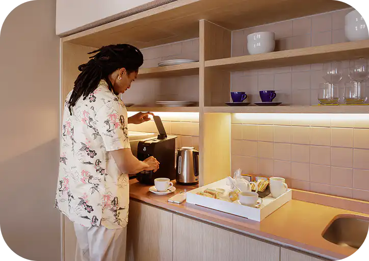 In-room coffee and tea station at Home Suite Hotels Sea Point