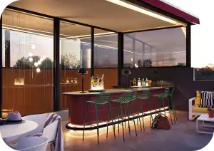Rooftop bar and lounge at Home Suite Hotels Rosebank at dusk